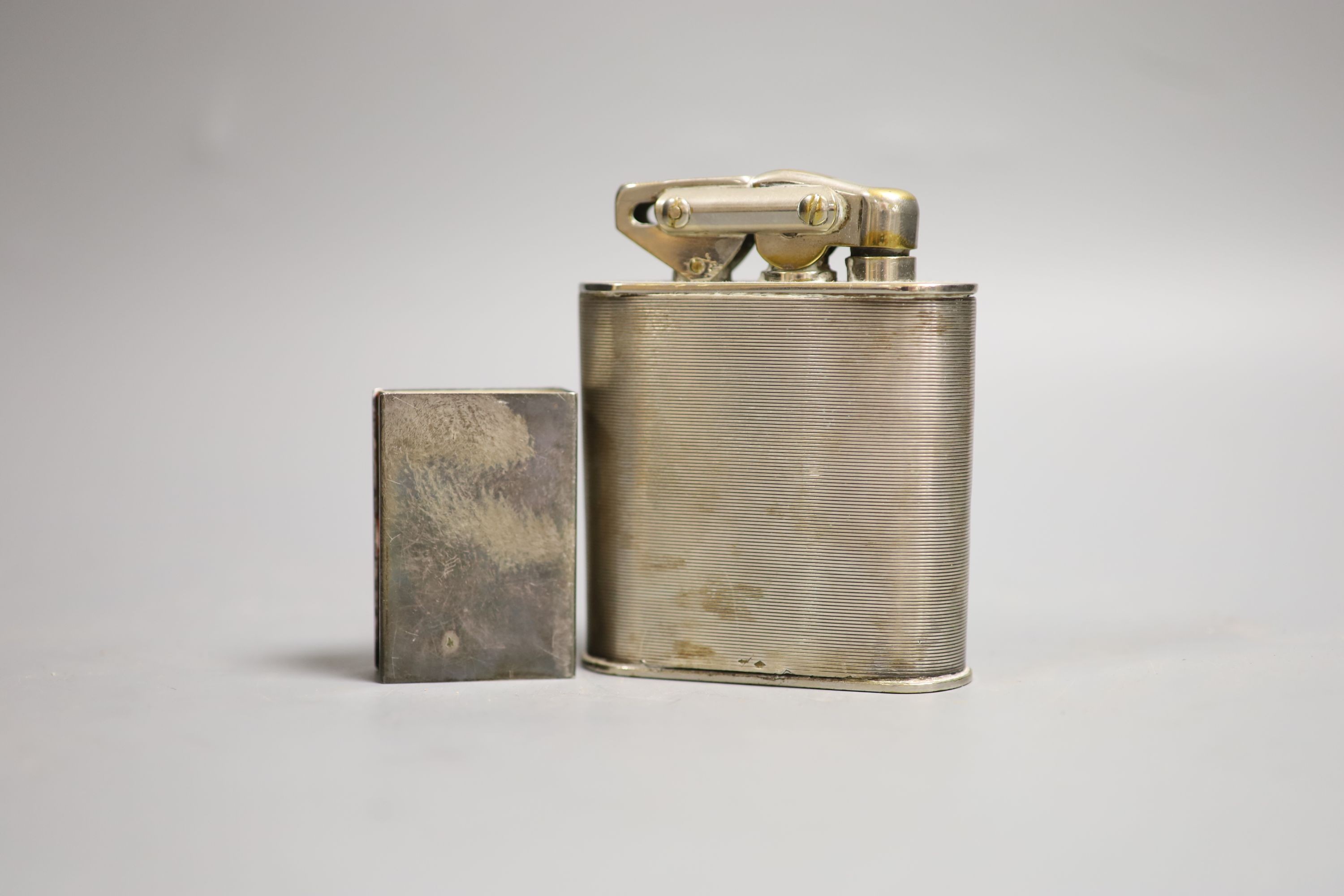 A K W plated table lighter, 10cm high and white metal match case holder